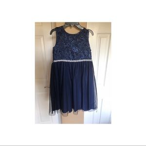 A kids size Special Occasion Dress.